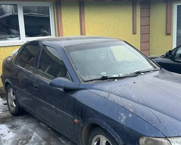 Синий Опель Вектра, объемом двигателя 2 л и пробегом 400 тыс. км за 500 $, фото 1 на Automoto.ua