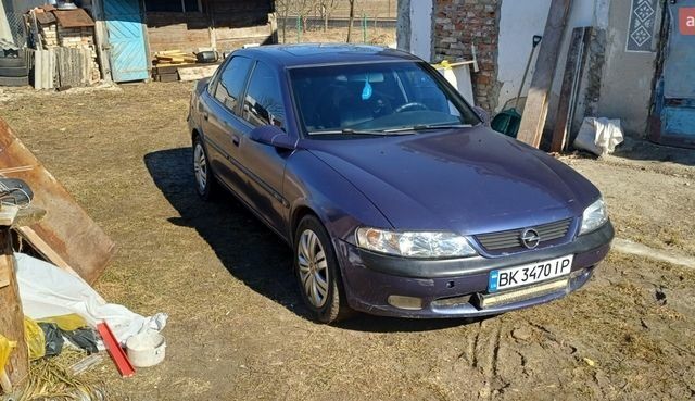 Синий Опель Вектра, объемом двигателя 2 л и пробегом 250 тыс. км за 2100 $, фото 1 на Automoto.ua