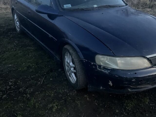 Синий Опель Вектра, объемом двигателя 0 л и пробегом 150 тыс. км за 600 $, фото 1 на Automoto.ua