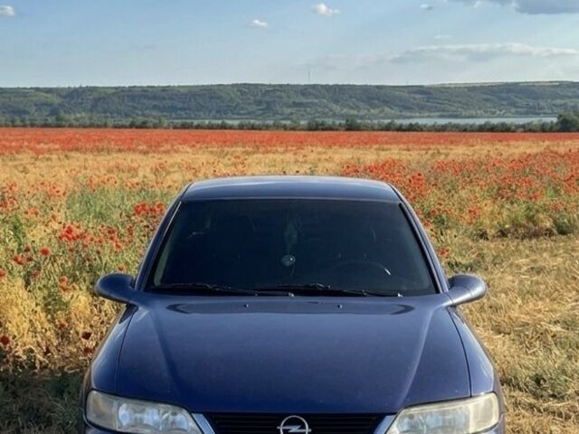 Синій Опель Вектра, об'ємом двигуна 2 л та пробігом 313 тис. км за 2801 $, фото 1 на Automoto.ua