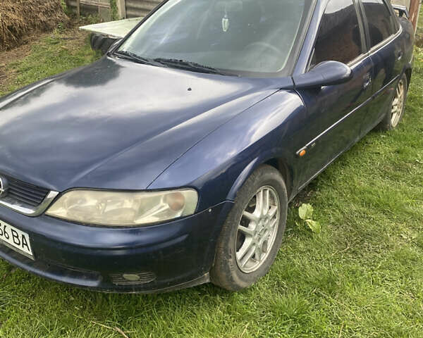 Синій Опель Вектра, об'ємом двигуна 2 л та пробігом 240 тис. км за 1300 $, фото 1 на Automoto.ua