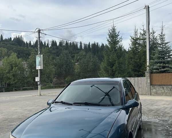 Синий Опель Вектра, объемом двигателя 1.6 л и пробегом 330 тыс. км за 2000 $, фото 1 на Automoto.ua