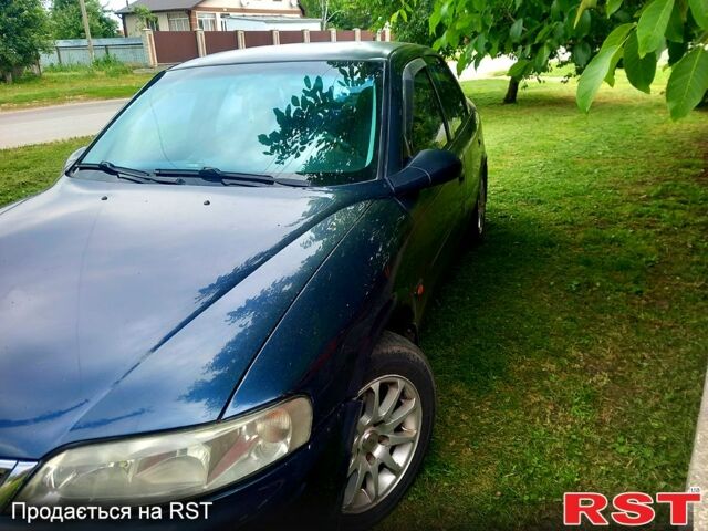 Синий Опель Вектра, объемом двигателя 1.8 л и пробегом 320 тыс. км за 1800 $, фото 1 на Automoto.ua