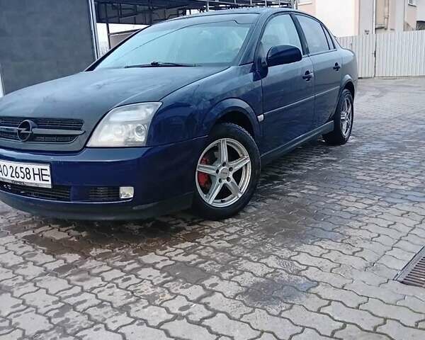 Синий Опель Вектра, объемом двигателя 2.2 л и пробегом 315 тыс. км за 2400 $, фото 1 на Automoto.ua