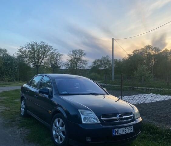 Синий Опель Вектра, объемом двигателя 2.2 л и пробегом 310 тыс. км за 2400 $, фото 1 на Automoto.ua