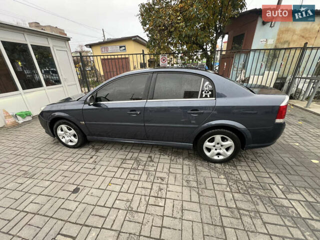 Синий Опель Вектра, объемом двигателя 2.2 л и пробегом 245 тыс. км за 5100 $, фото 1 на Automoto.ua