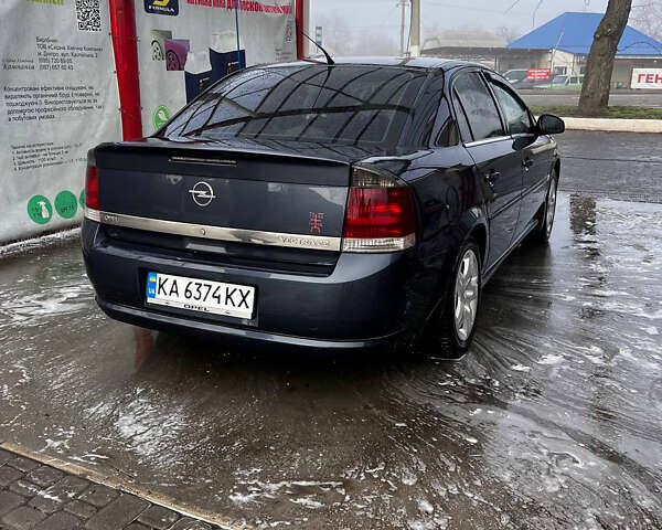 Синий Опель Вектра, объемом двигателя 2 л и пробегом 300 тыс. км за 5933 $, фото 1 на Automoto.ua