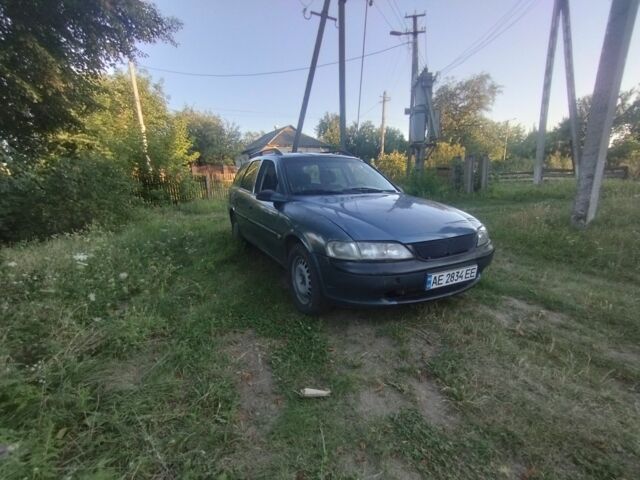 Синий Опель Вектра, объемом двигателя 1.6 л и пробегом 300 тыс. км за 1251 $, фото 1 на Automoto.ua