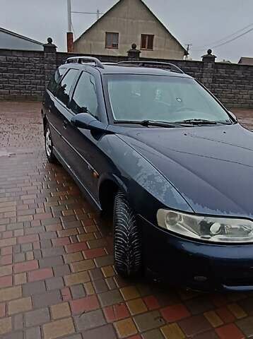 Синий Опель Вектра, объемом двигателя 1.6 л и пробегом 150 тыс. км за 1600 $, фото 1 на Automoto.ua