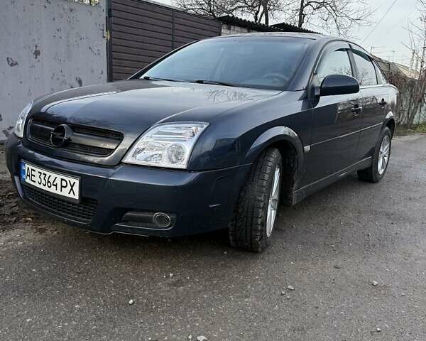Синий Опель Вектра, объемом двигателя 2.2 л и пробегом 250 тыс. км за 4999 $, фото 1 на Automoto.ua