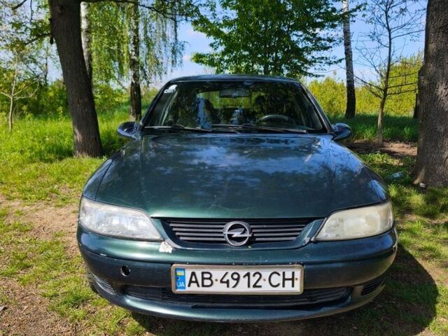 Зеленый Опель Вектра, объемом двигателя 1.8 л и пробегом 306 тыс. км за 1026 $, фото 1 на Automoto.ua