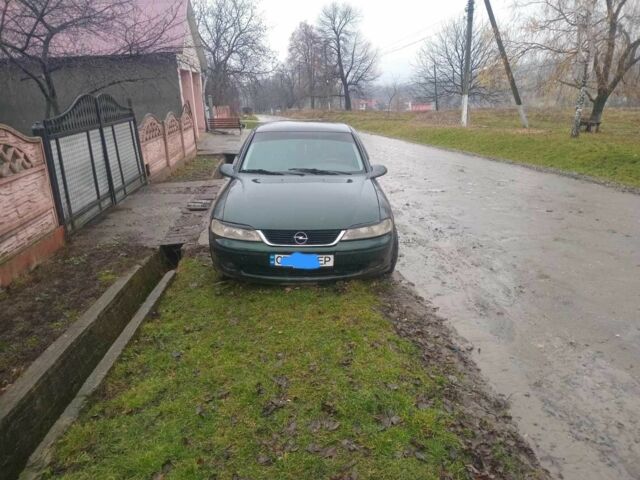 Зеленый Опель Вектра, объемом двигателя 2 л и пробегом 256 тыс. км за 700 $, фото 1 на Automoto.ua