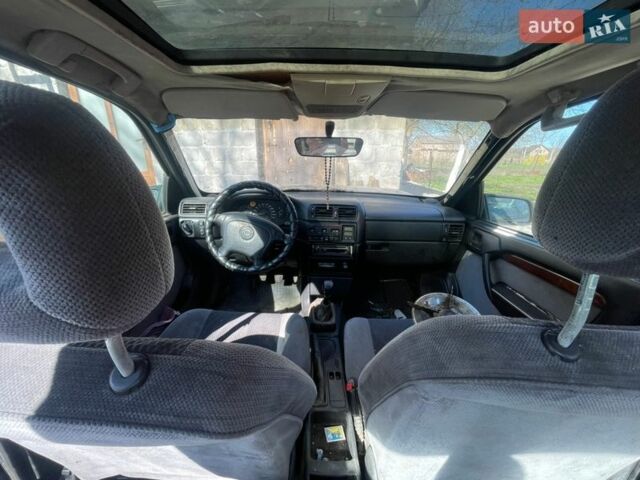 Зеленый Опель Вектра, объемом двигателя 2 л и пробегом 240 тыс. км за 900 $, фото 1 на Automoto.ua