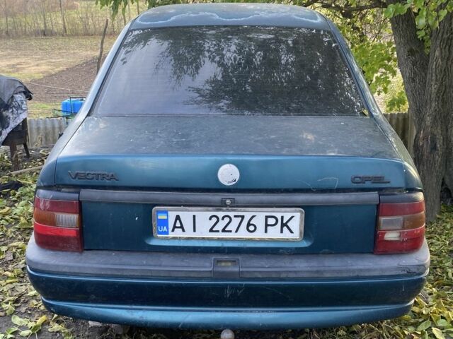 Зеленый Опель Вектра, объемом двигателя 1.6 л и пробегом 395 тыс. км за 950 $, фото 1 на Automoto.ua
