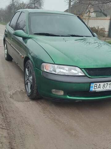 Зеленый Опель Вектра, объемом двигателя 2 л и пробегом 246 тыс. км за 2000 $, фото 1 на Automoto.ua