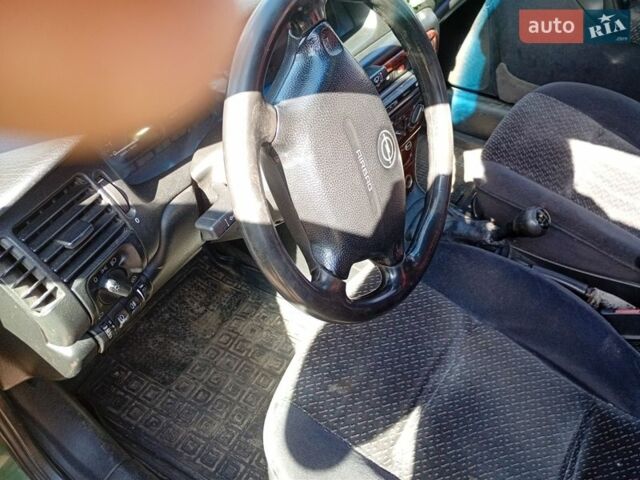 Зеленый Опель Вектра, объемом двигателя 2 л и пробегом 250 тыс. км за 1700 $, фото 1 на Automoto.ua