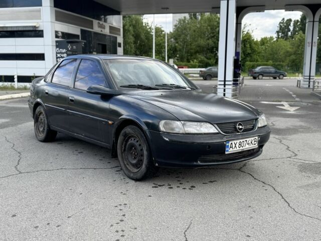 Зеленый Опель Вектра, объемом двигателя 1.6 л и пробегом 292 тыс. км за 900 $, фото 1 на Automoto.ua