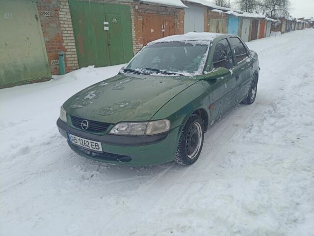 Зеленый Опель Вектра, объемом двигателя 1.6 л и пробегом 390 тыс. км за 900 $, фото 1 на Automoto.ua