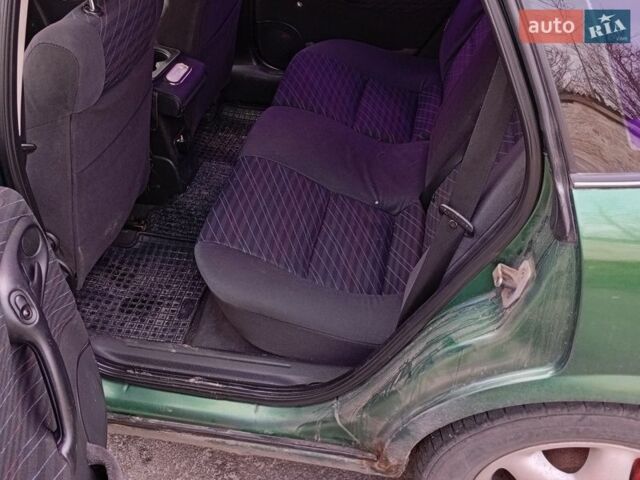 Зеленый Опель Вектра, объемом двигателя 1.8 л и пробегом 387 тыс. км за 2000 $, фото 1 на Automoto.ua