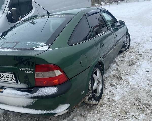 Зеленый Опель Вектра, объемом двигателя 2 л и пробегом 230 тыс. км за 2200 $, фото 1 на Automoto.ua