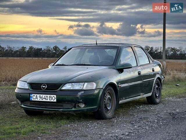 Зеленый Опель Вектра, объемом двигателя 1.8 л и пробегом 344 тыс. км за 1650 $, фото 1 на Automoto.ua