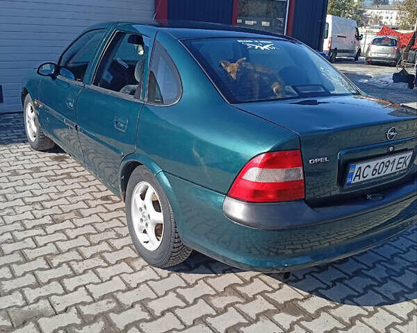 Зеленый Опель Вектра, объемом двигателя 2 л и пробегом 200 тыс. км за 1750 $, фото 1 на Automoto.ua