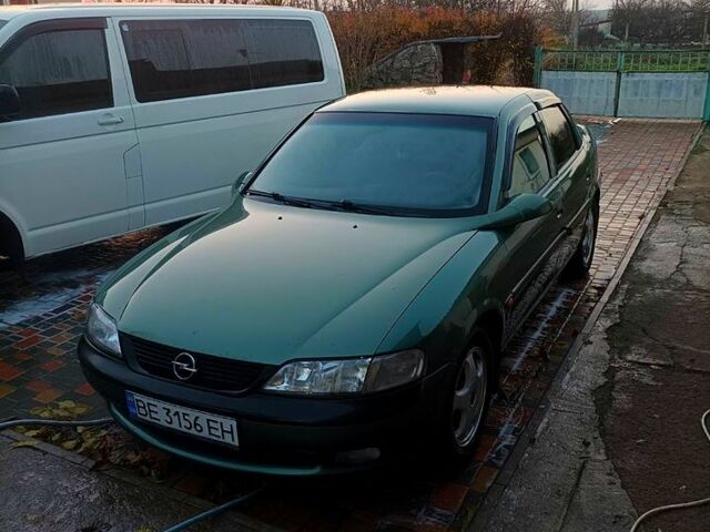 Зеленый Опель Вектра, объемом двигателя 1.6 л и пробегом 303 тыс. км за 2400 $, фото 1 на Automoto.ua