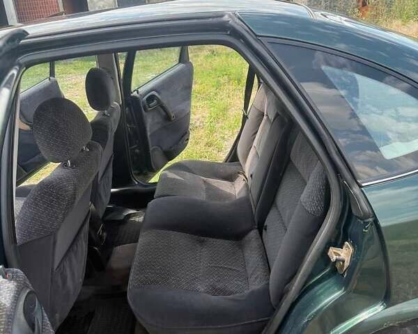 Зеленый Опель Вектра, объемом двигателя 2 л и пробегом 400 тыс. км за 2100 $, фото 1 на Automoto.ua