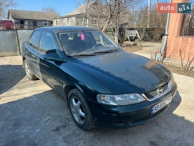 Зеленый Опель Вектра, объемом двигателя 1.8 л и пробегом 450 тыс. км за 1750 $, фото 1 на Automoto.ua