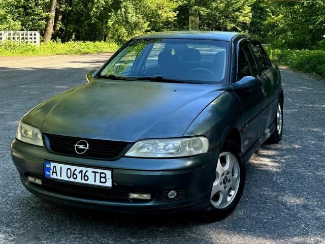 Зеленый Опель Вектра, объемом двигателя 1.8 л и пробегом 334 тыс. км за 2399 $, фото 1 на Automoto.ua