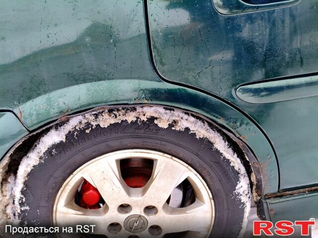 Зелений Опель Вектра, об'ємом двигуна 2 л та пробігом 312 тис. км за 3100 $, фото 1 на Automoto.ua