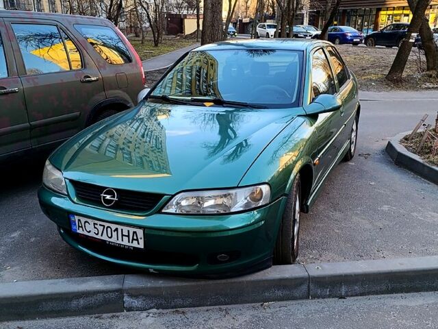 Зелений Опель Вектра, об'ємом двигуна 2 л та пробігом 235 тис. км за 1997 $, фото 1 на Automoto.ua
