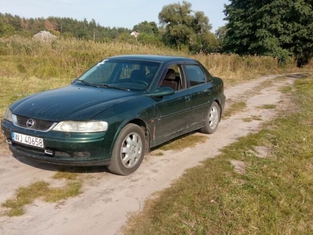 Зеленый Опель Вектра, объемом двигателя 2 л и пробегом 300 тыс. км за 898 $, фото 1 на Automoto.ua