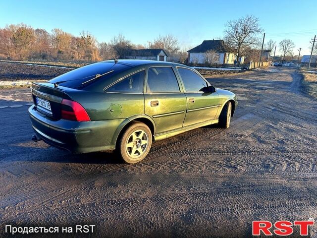 Зелений Опель Вектра, об'ємом двигуна 2 л та пробігом 244 тис. км за 2300 $, фото 1 на Automoto.ua