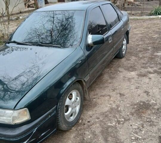 Зеленый Опель Вектра, объемом двигателя 2 л и пробегом 393 тыс. км за 1300 $, фото 1 на Automoto.ua