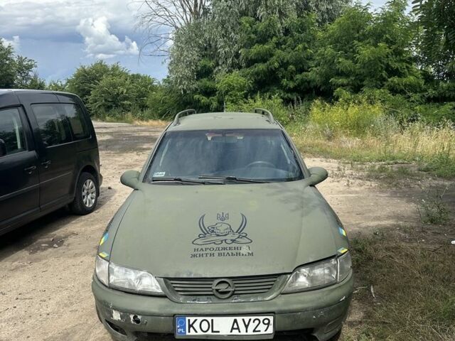 Зеленый Опель Вектра, объемом двигателя 2 л и пробегом 225 тыс. км за 700 $, фото 1 на Automoto.ua