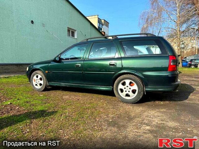Зеленый Опель Вектра, объемом двигателя 1.8 л и пробегом 350 тыс. км за 3300 $, фото 1 на Automoto.ua