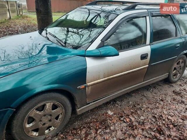 Зеленый Опель Вектра, объемом двигателя 2 л и пробегом 430 тыс. км за 50000 $, фото 1 на Automoto.ua