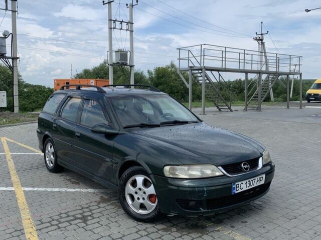 Зелений Опель Вектра, об'ємом двигуна 2.2 л та пробігом 250 тис. км за 2400 $, фото 1 на Automoto.ua