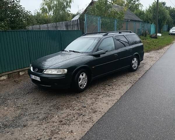 Зеленый Опель Вектра, объемом двигателя 2 л и пробегом 350 тыс. км за 3250 $, фото 1 на Automoto.ua