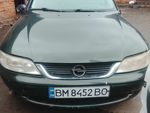 Зеленый Опель Вектра, объемом двигателя 1 л и пробегом 290 тыс. км за 850 $, фото 1 на Automoto.ua