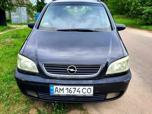 Черный Опель Зафира, объемом двигателя 1.8 л и пробегом 303 тыс. км за 2600 $, фото 1 на Automoto.ua