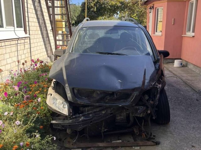 Черный Опель Зафира, объемом двигателя 2 л и пробегом 200 тыс. км за 1200 $, фото 1 на Automoto.ua