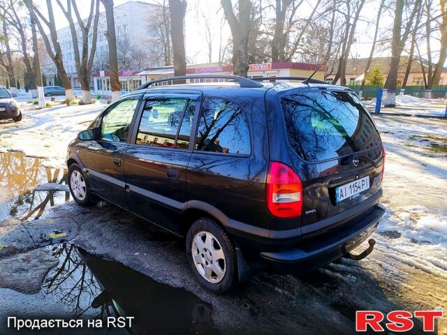 Черный Опель Зафира, объемом двигателя 2 л и пробегом 412 тыс. км за 3300 $, фото 1 на Automoto.ua