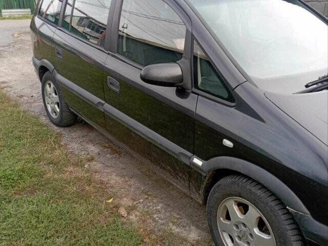 Чорний Опель Зафіра, об'ємом двигуна 2 л та пробігом 245 тис. км за 2613 $, фото 1 на Automoto.ua