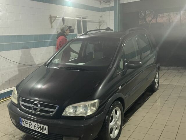 Черный Опель Зафира, объемом двигателя 2 л и пробегом 200 тыс. км за 1100 $, фото 1 на Automoto.ua