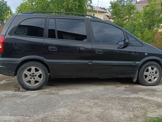Чорний Опель Зафіра, об'ємом двигуна 2 л та пробігом 215 тис. км за 2500 $, фото 1 на Automoto.ua