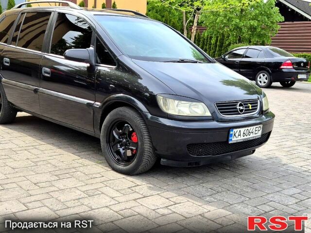 Черный Опель Зафира, объемом двигателя 2 л и пробегом 196 тыс. км за 4800 $, фото 1 на Automoto.ua