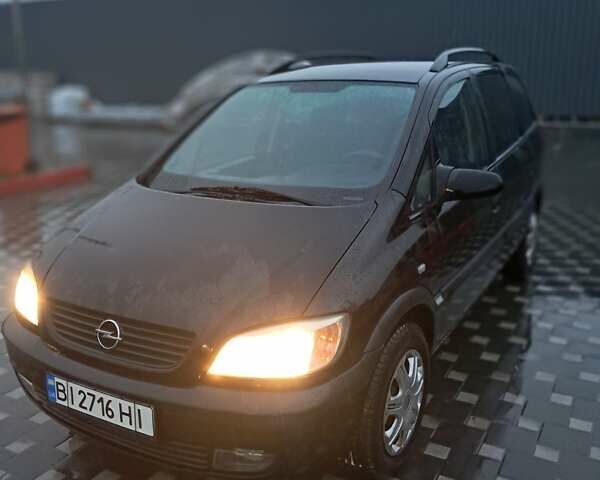 Черный Опель Зафира, объемом двигателя 2.17 л и пробегом 315 тыс. км за 3777 $, фото 1 на Automoto.ua