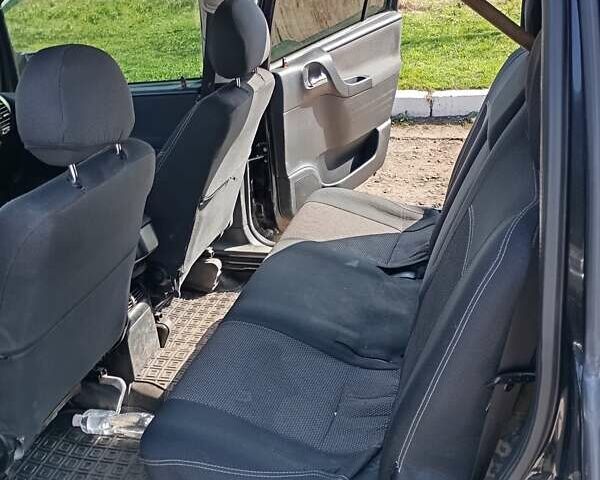 Чорний Опель Зафіра, об'ємом двигуна 2 л та пробігом 220 тис. км за 3595 $, фото 1 на Automoto.ua